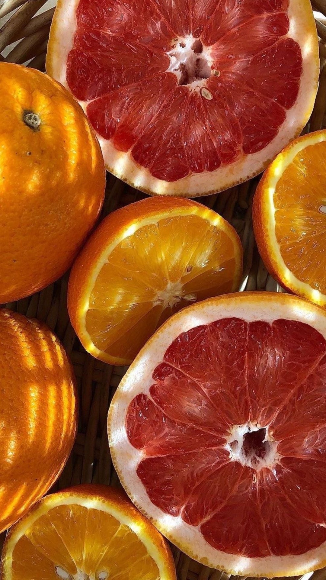 cut citrus fruits oranges and grapefruit to represent the scent category citrus for the brand defrei  