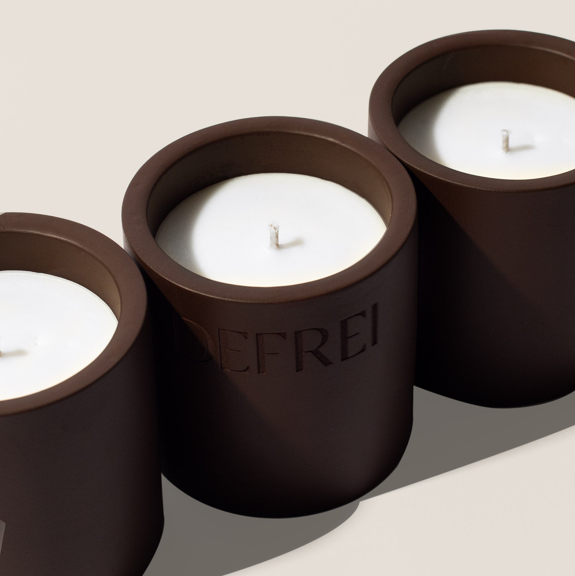 DEFREI LOBBY close up shot of the hand poured luxury scented candle